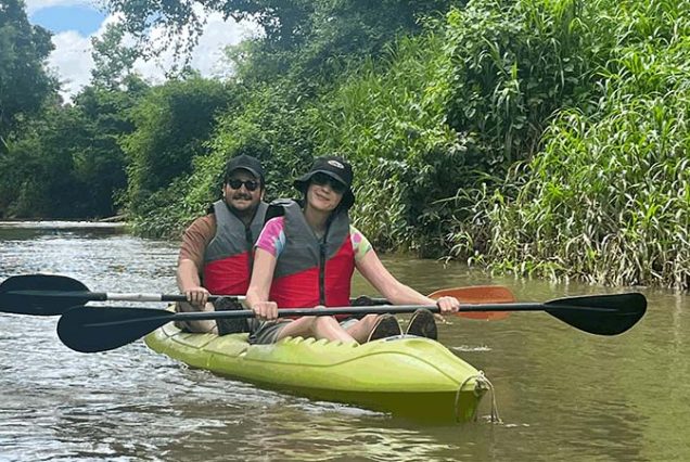 Two people paddling down the Rio Frio in a Safari float by Kayak.