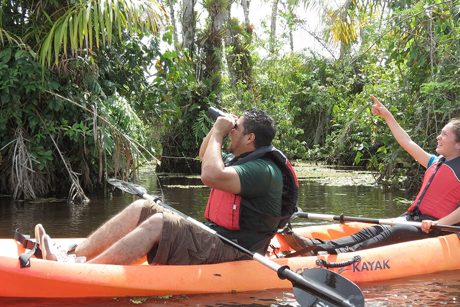 A couple on a boat in the Safari In the Rio Frio