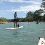 A girl on a SUP in the rio frio with morning light