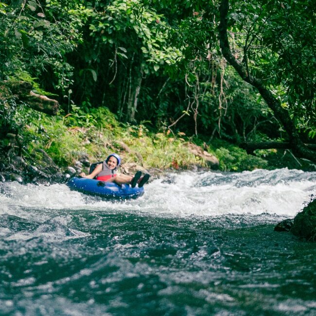 A moment of tubing down Rio Celeste Costa Rica part of the Tubing Tour of Onca Tours