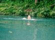 Girl Swimming In Rio Celeste