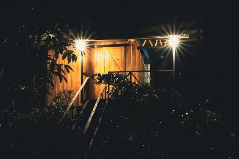 A panoramic view at night of a tree house costa rica