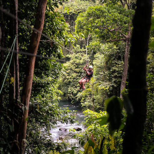 A man moving through zip line