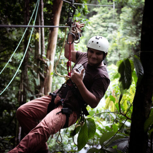 A man moving through zip line